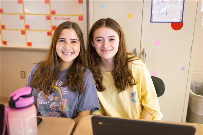 Sunset Middle female students at their desk